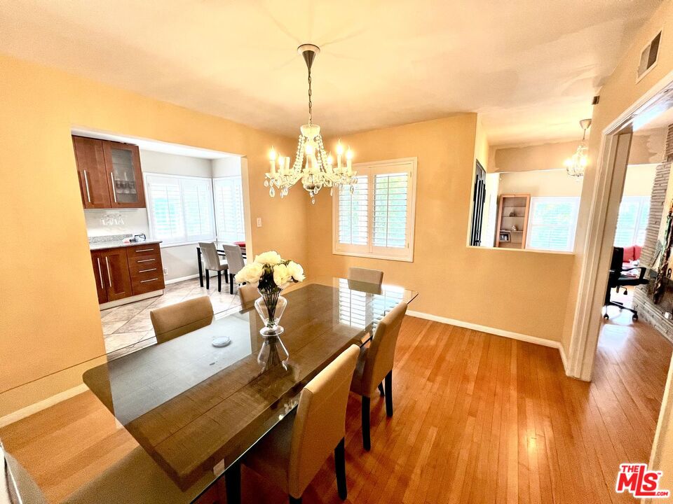 4340 Sepulveda Boulevard Sherman Oaks, CA 91403 - Photo 7 of 30 a living room with furniture and a table