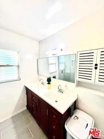 a bathroom with a sink and a toilet
