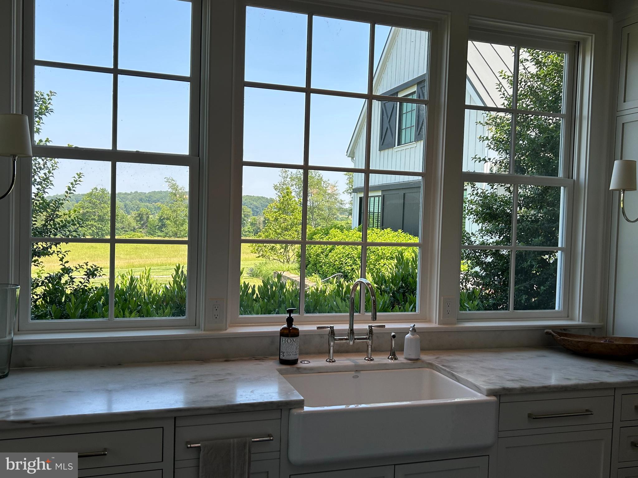 7316 Old Carters Mill Road The Plains, VA 20198 - Photo 37 of 61 a kitchen with a sink and a large window