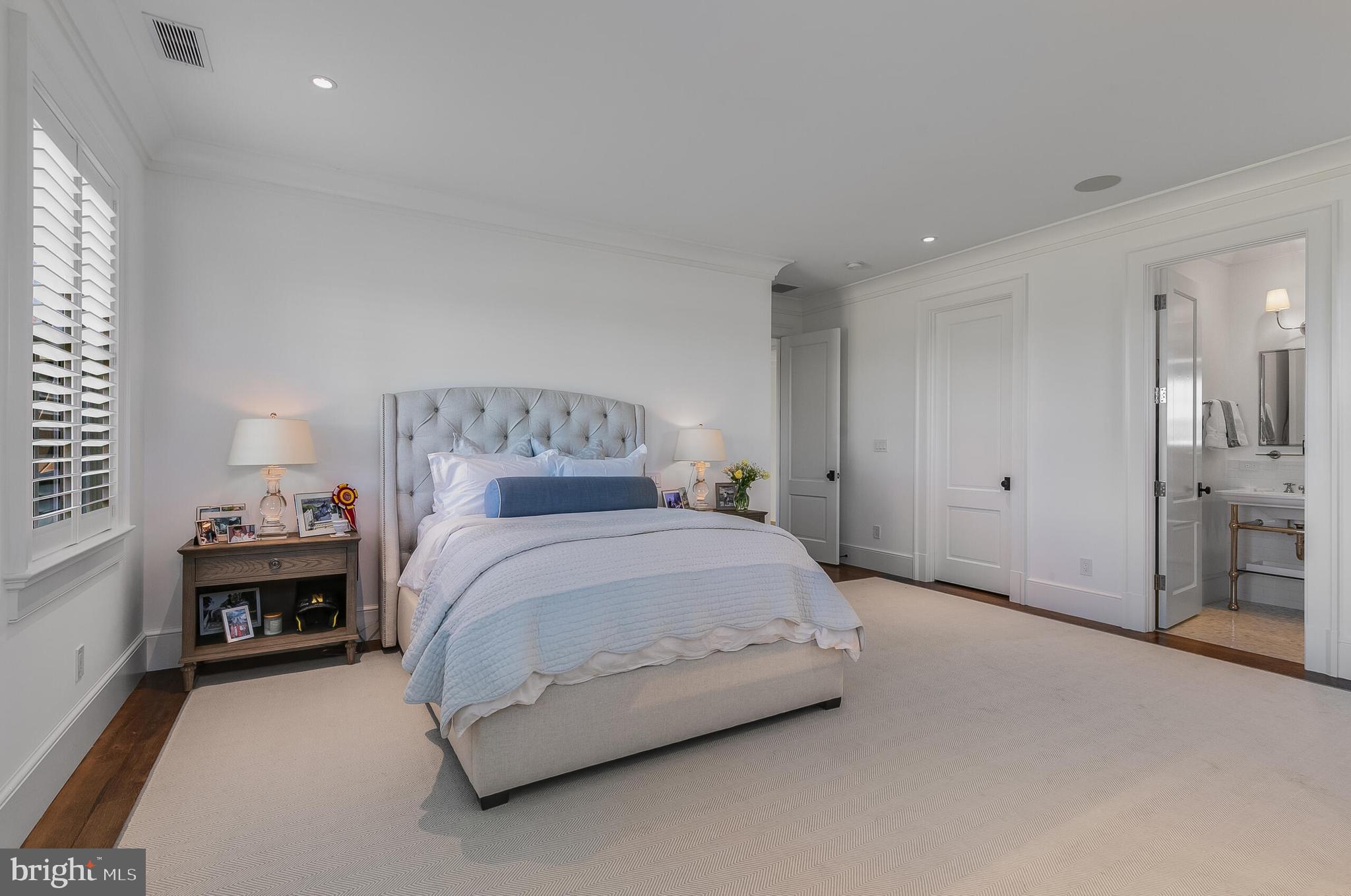 7316 Old Carters Mill Road The Plains, VA 20198 - Photo 48 of 61 a spacious bedroom with a bed and a lamp