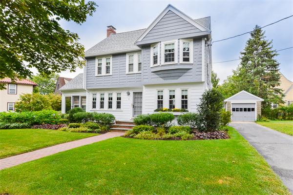 8 Richfield Road Arlington, MA 02474 - Photo 1 of 25 a front view of a house with a yard and green space