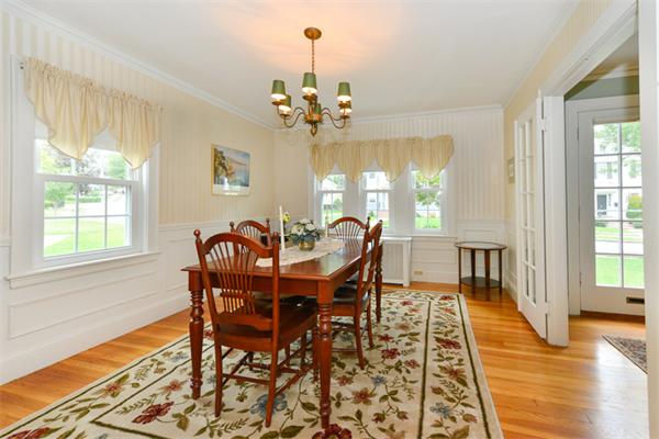 8 Richfield Road Arlington, MA 02474 - Photo 11 of 25 a view of a dining room with furniture a chandelier and wooden floor