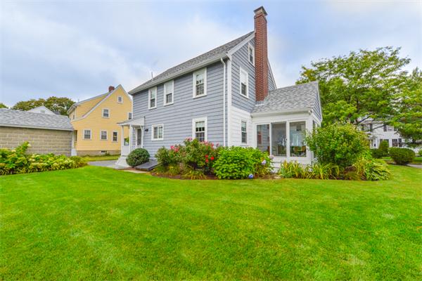 8 Richfield Road Arlington, MA 02474 - Photo 3 of 25 a front view of a house with garden