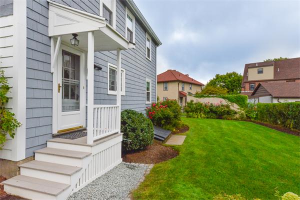 8 Richfield Road Arlington, MA 02474 - Photo 5 of 25 a front view of a house with garden