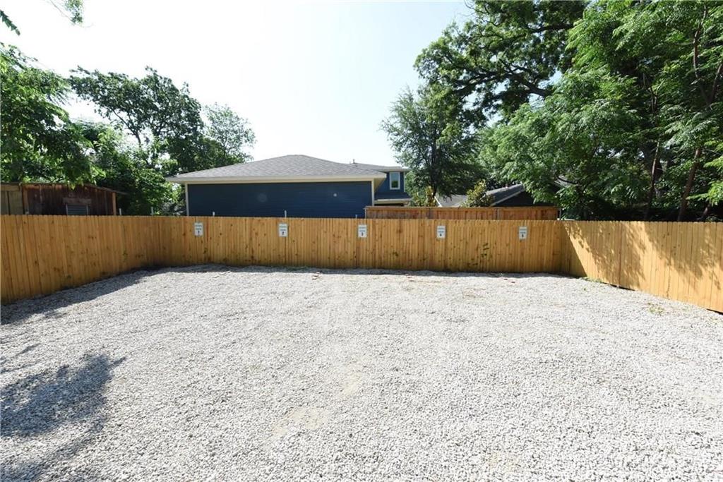 4612 Junius Street, Unit B Dallas, TX 75246 - Photo 12 of 14 a backyard of a house