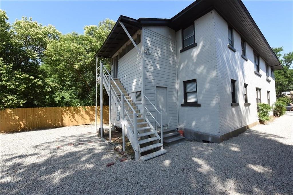 4612 Junius Street, Unit B Dallas, TX 75246 - Photo 14 of 14 a view of a house with a yard