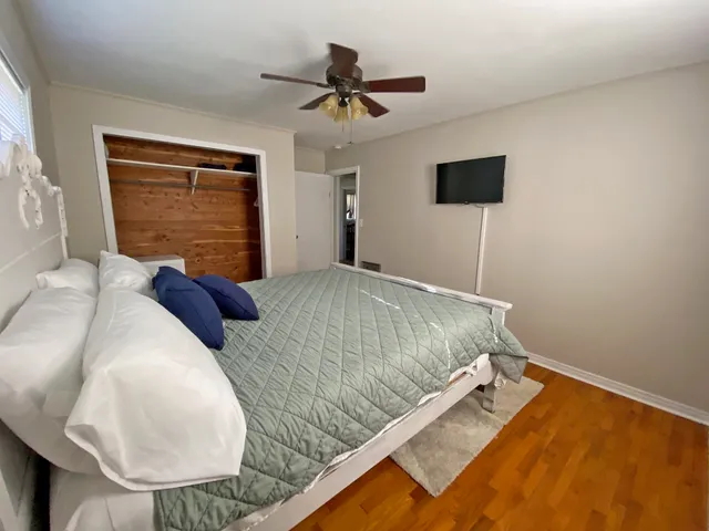 a bed room with a bed and a couch