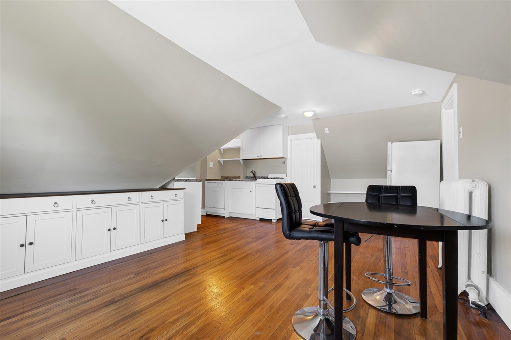 28 Evergreen Street, Unit 3 Boston, MA 02130 - Photo 4 of 16 a view of a workspace with furniture