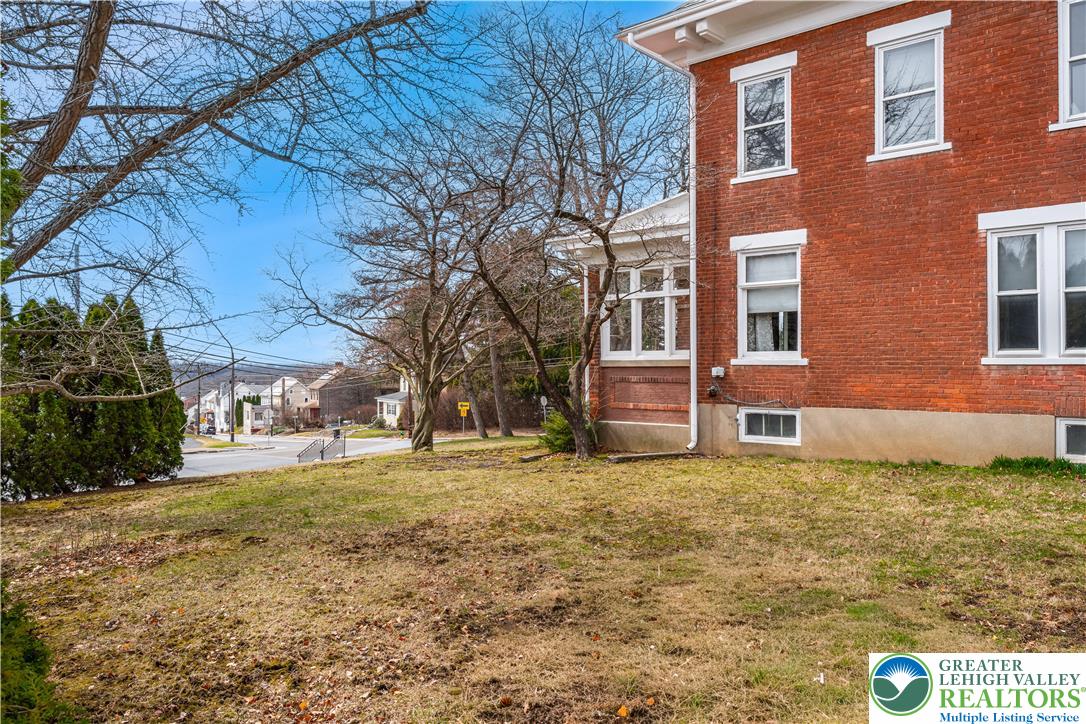 4349 Main Street Whitehall, PA 18052 - Photo 11 of 42 a view of a house with a yard
