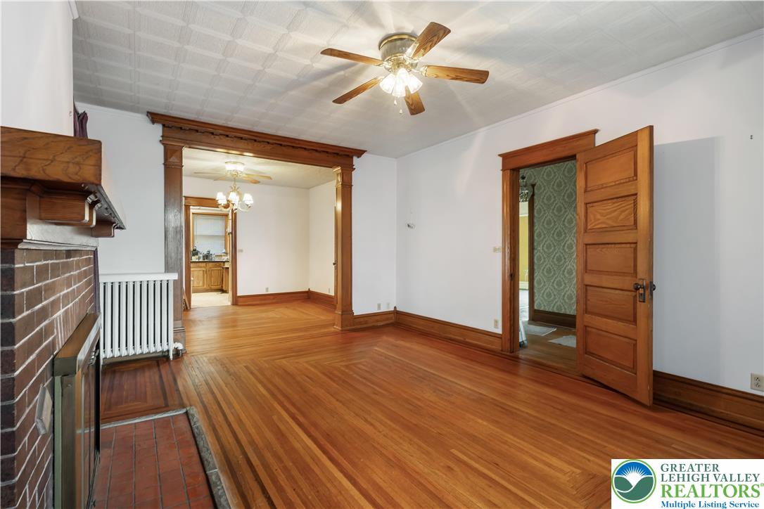 4349 Main Street Whitehall, PA 18052 - Photo 15 of 42 a view of an empty room with wooden floor