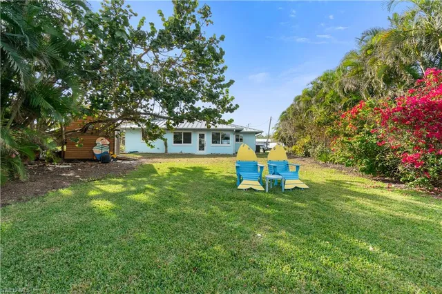 a view of a house with a park