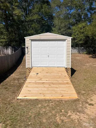 a view of backyard with green space