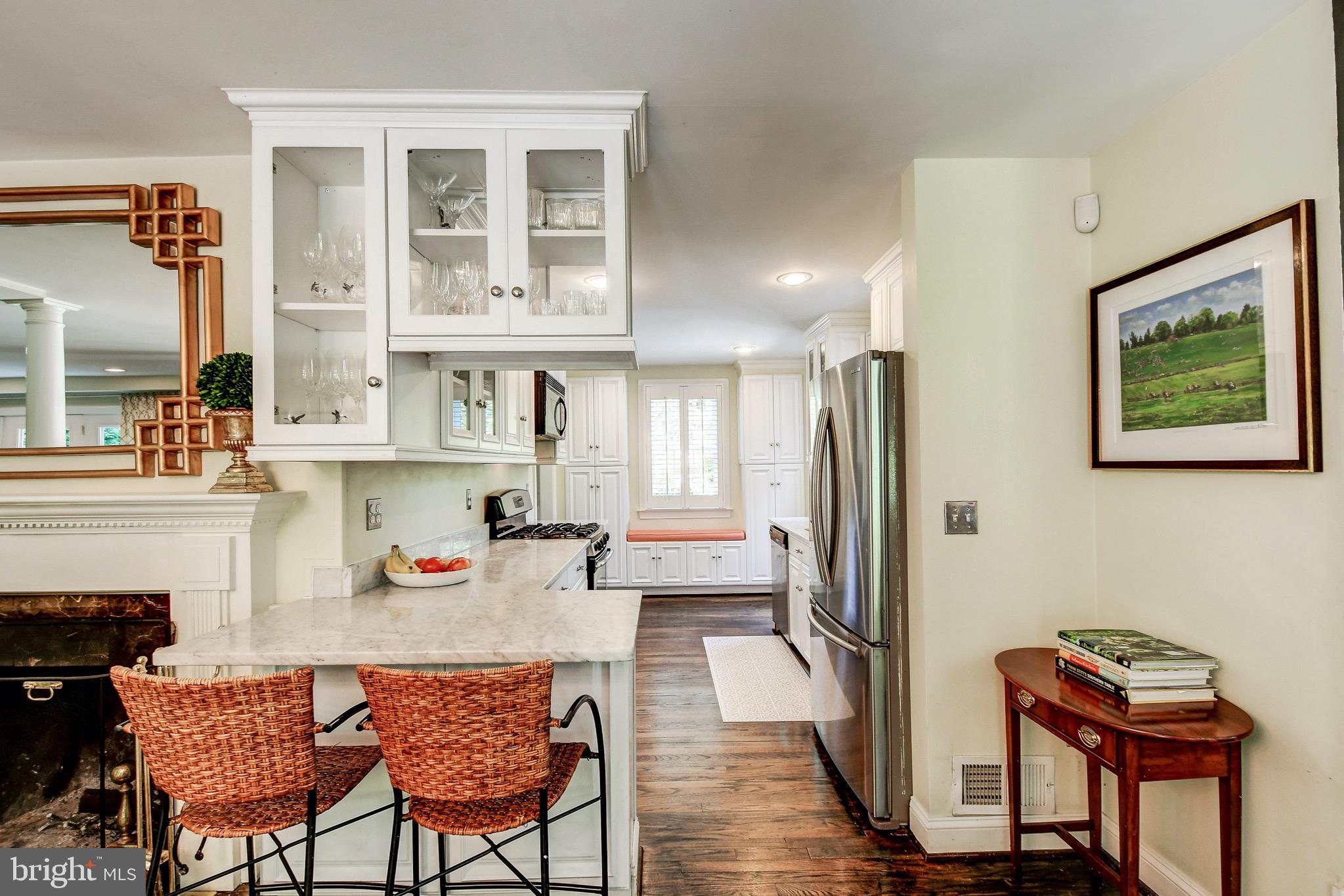 1741 Circle Road Baltimore, MD 21204 - Photo 20 of 40 a dining room with furniture and a fireplace