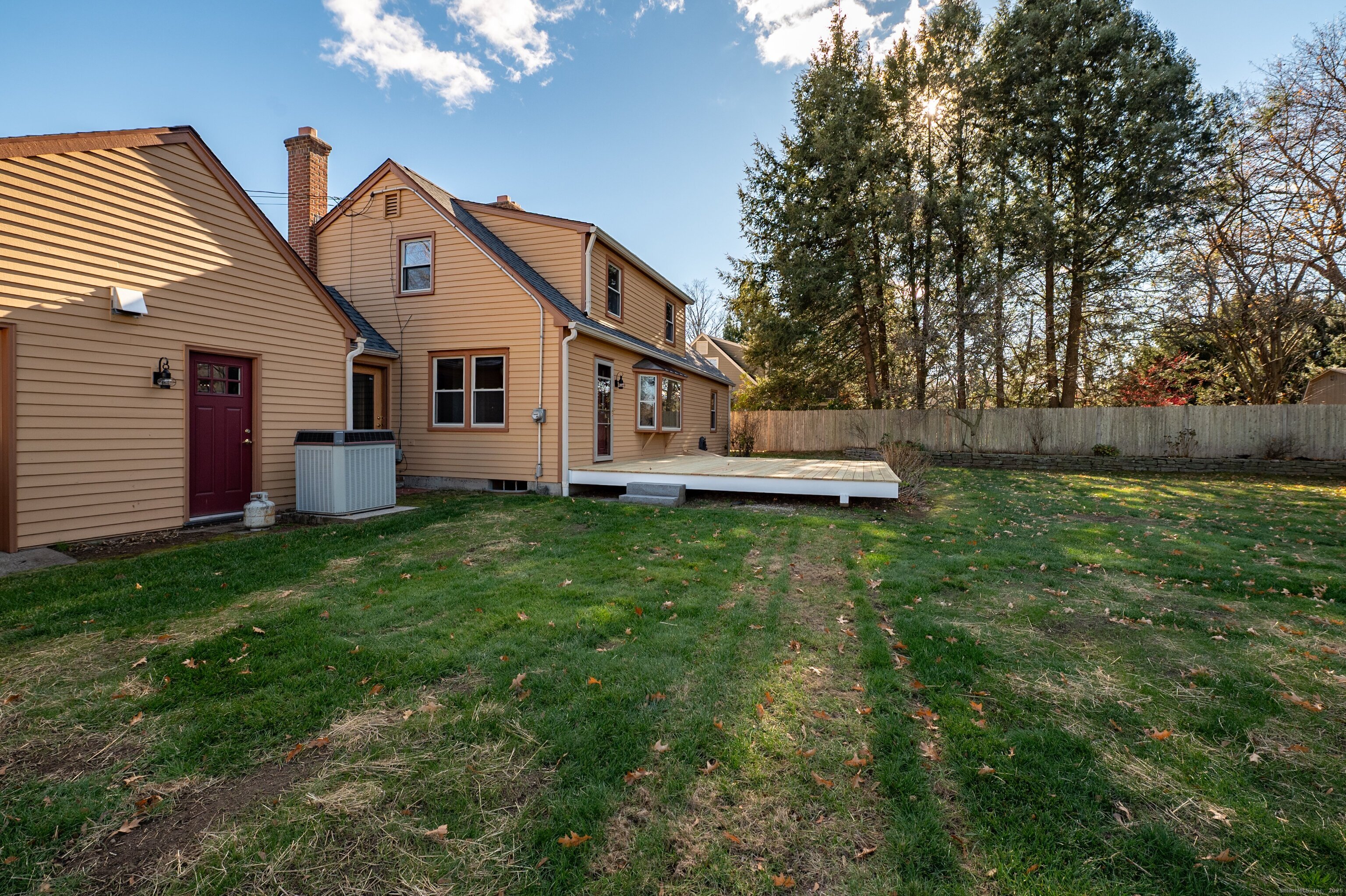 975 Wolf Hill Road Cheshire, CT 06410 - Photo 31 of 40 a front view of house with a garden