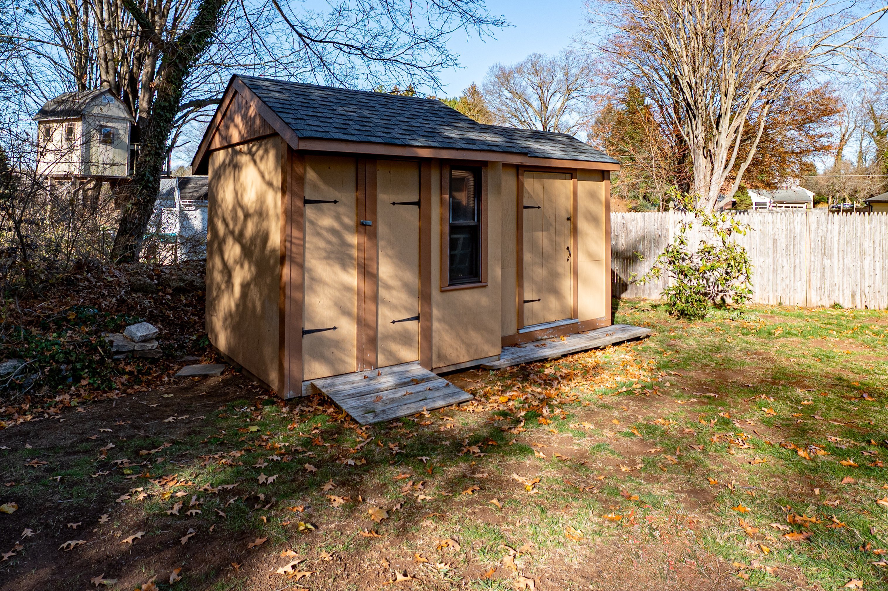 975 Wolf Hill Road Cheshire, CT 06410 - Photo 35 of 40 a view of a house with a yard