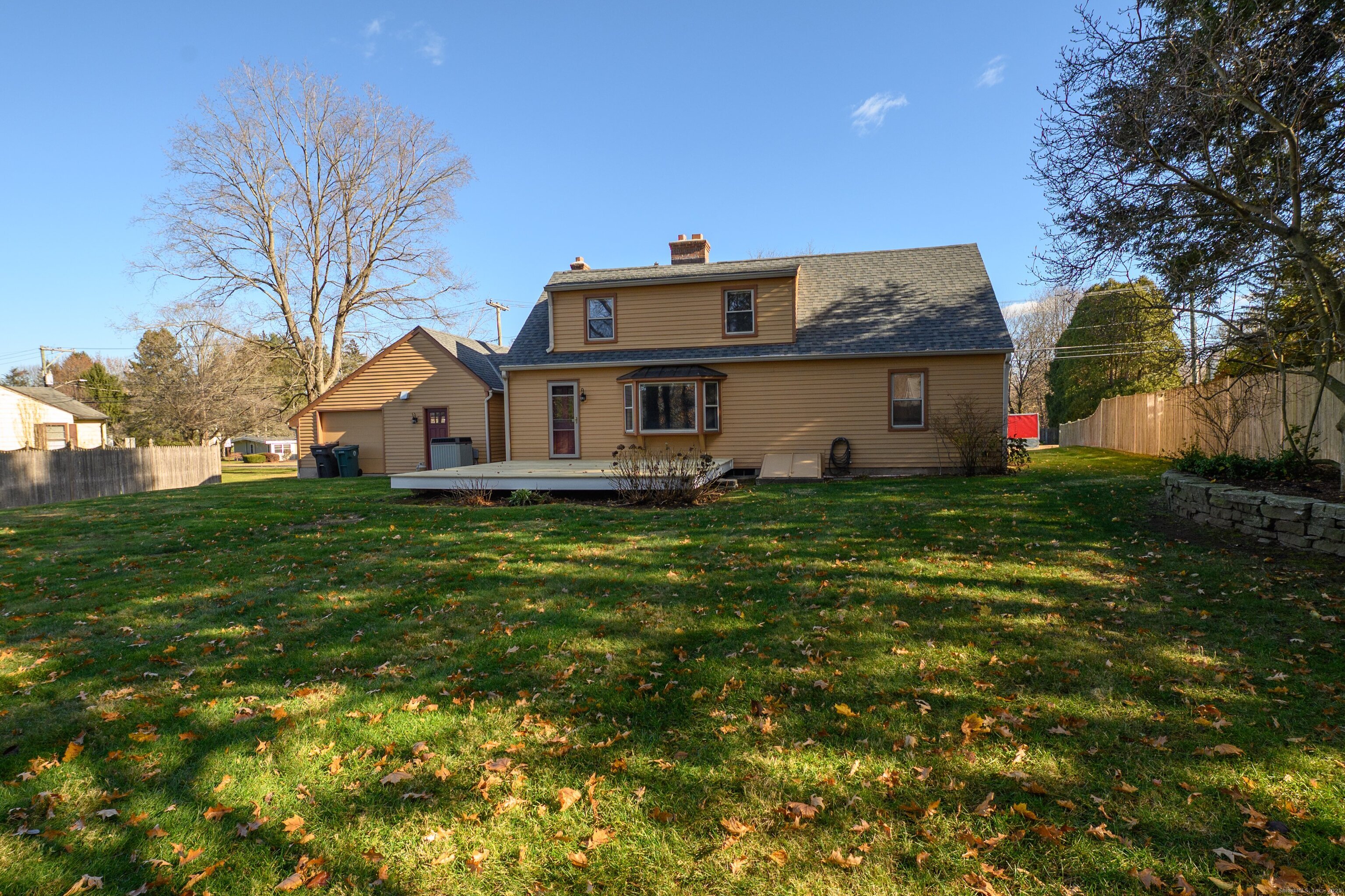 975 Wolf Hill Road Cheshire, CT 06410 - Photo 36 of 40 a front view of a house with garden