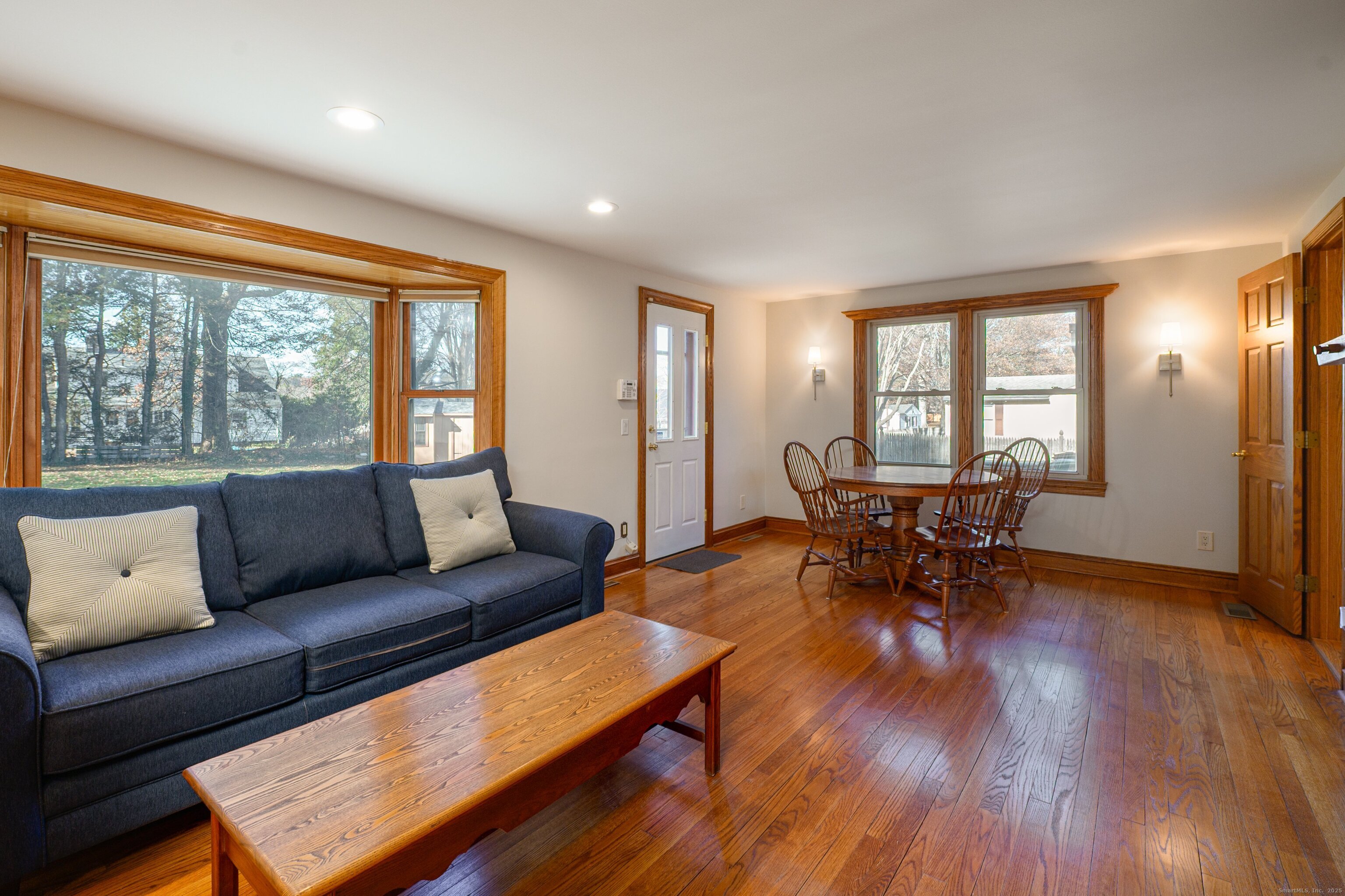 975 Wolf Hill Road Cheshire, CT 06410 - Photo 5 of 40 a living room with furniture and a large window