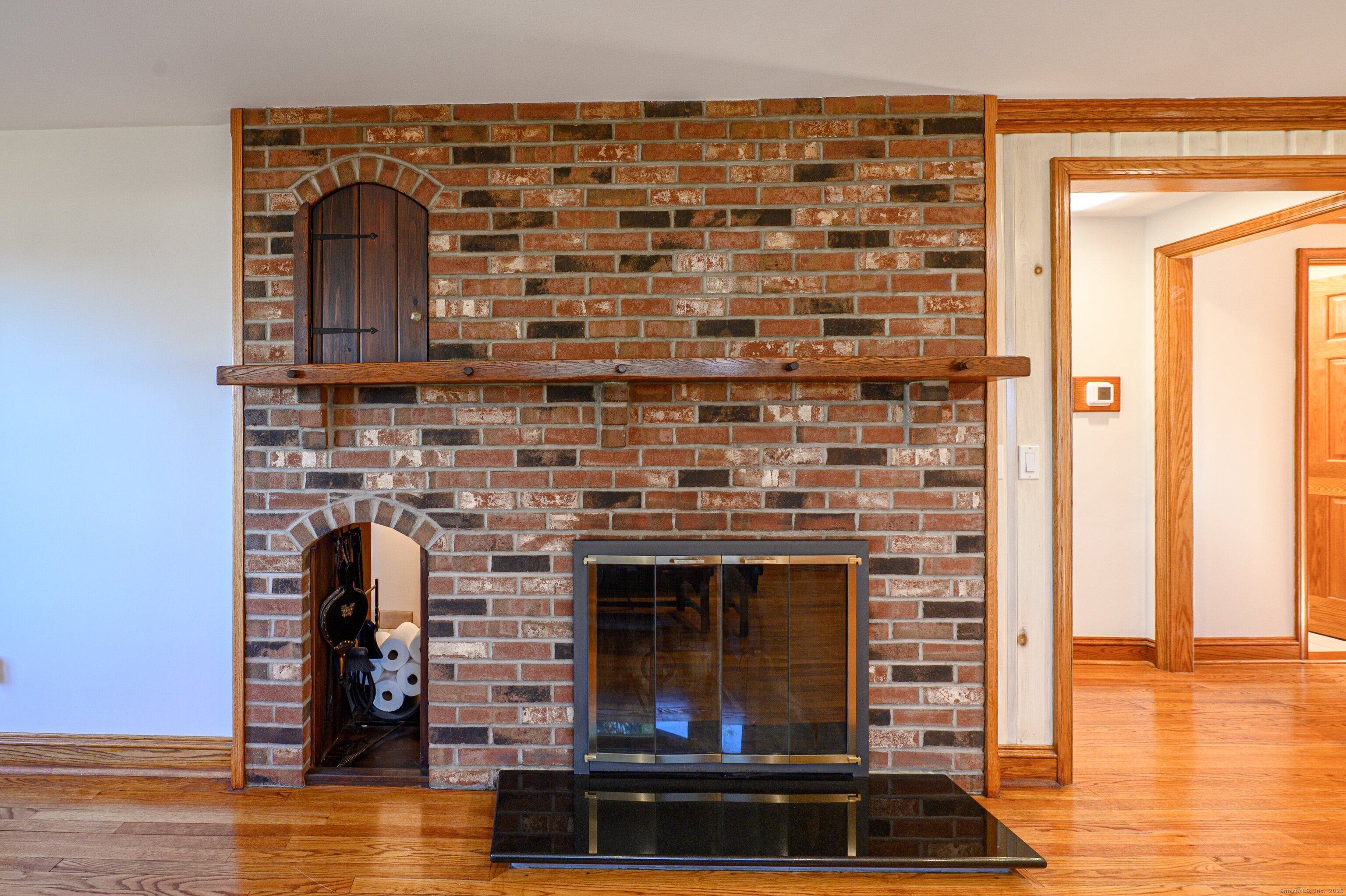 975 Wolf Hill Road Cheshire, CT 06410 - Photo 6 of 40 a living room with fireplace