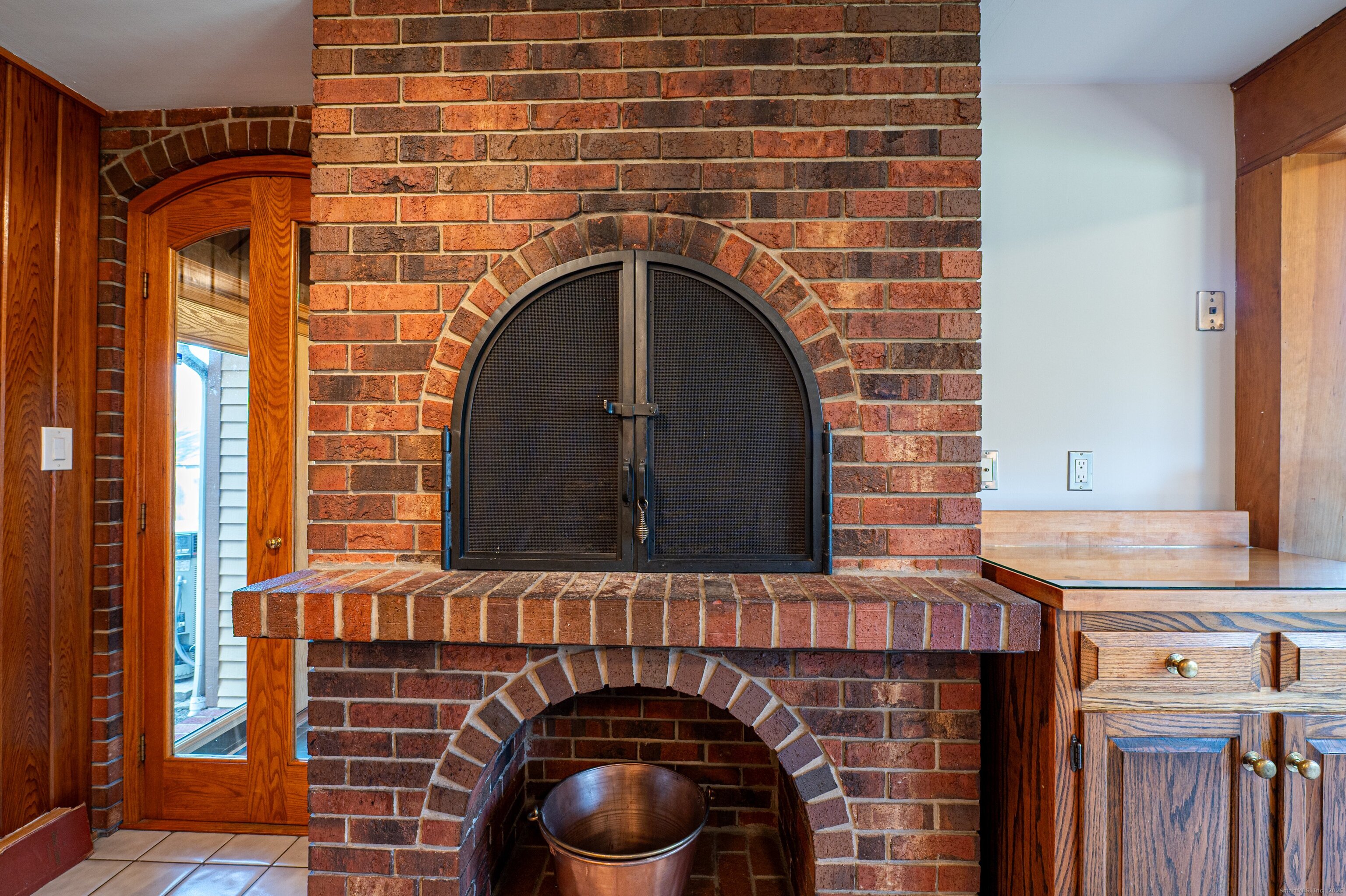 975 Wolf Hill Road Cheshire, CT 06410 - Photo 8 of 40 a close view of a fireplace and a sink