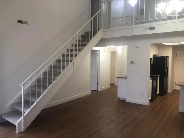 a view of entryway with wooden floor