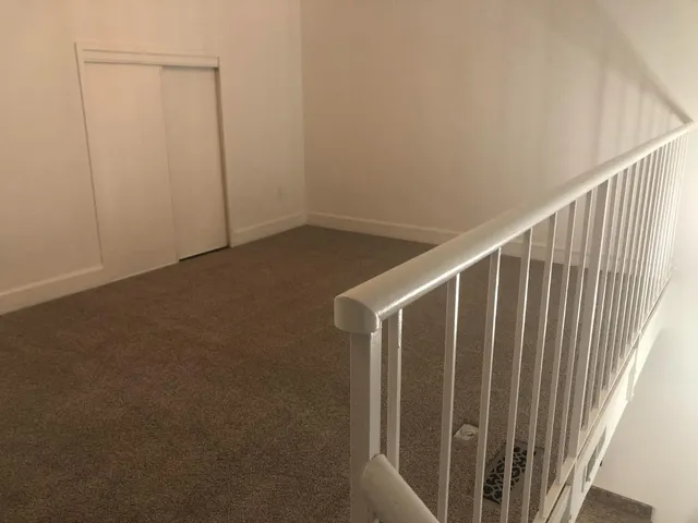 a view of entryway with stairs