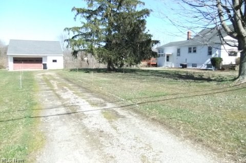 6127 Hopkins Road Mentor, OH 44060 - Photo 1 of 12 There is a turn around driveway between garage and home.
