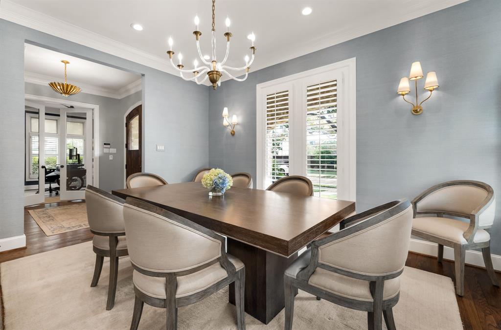 4715 Purdue Avenue Dallas, TX 75209 - Photo 3 of 30 a view of a dining room with furniture and chandelier