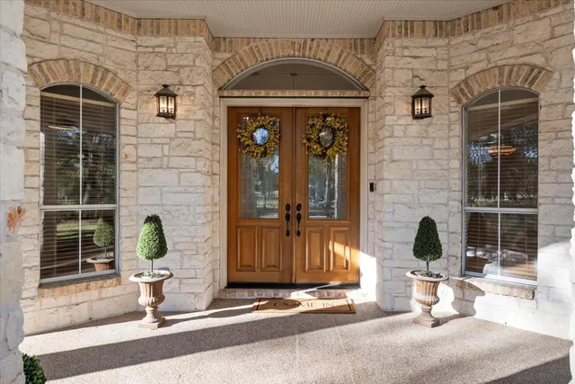a front view of a house with outdoor space