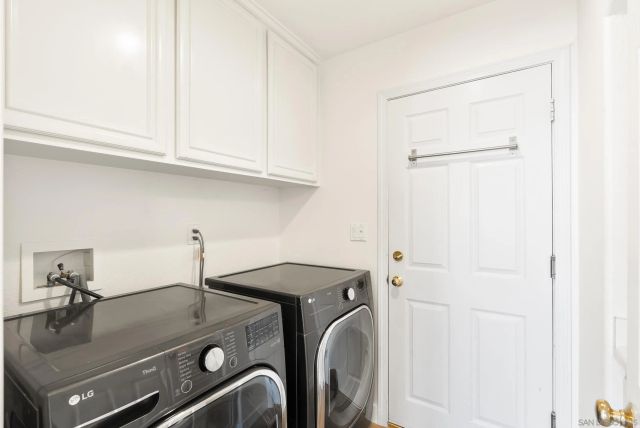 a view of a swimming pool with sitting area