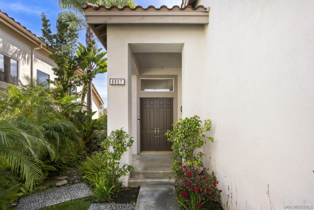 a house with a flower garden