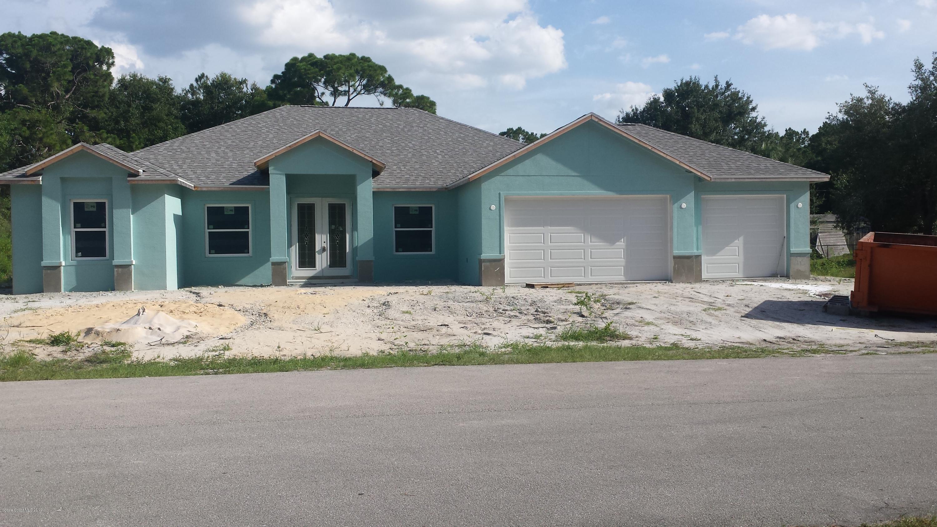 716 Doverbrook Road Northwest Palm Bay, FL 32907 - Photo 1 of 3 Doverbrook front