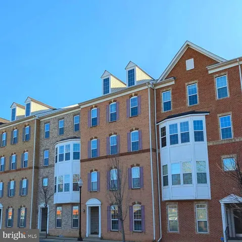 a front view of a building with glass windows