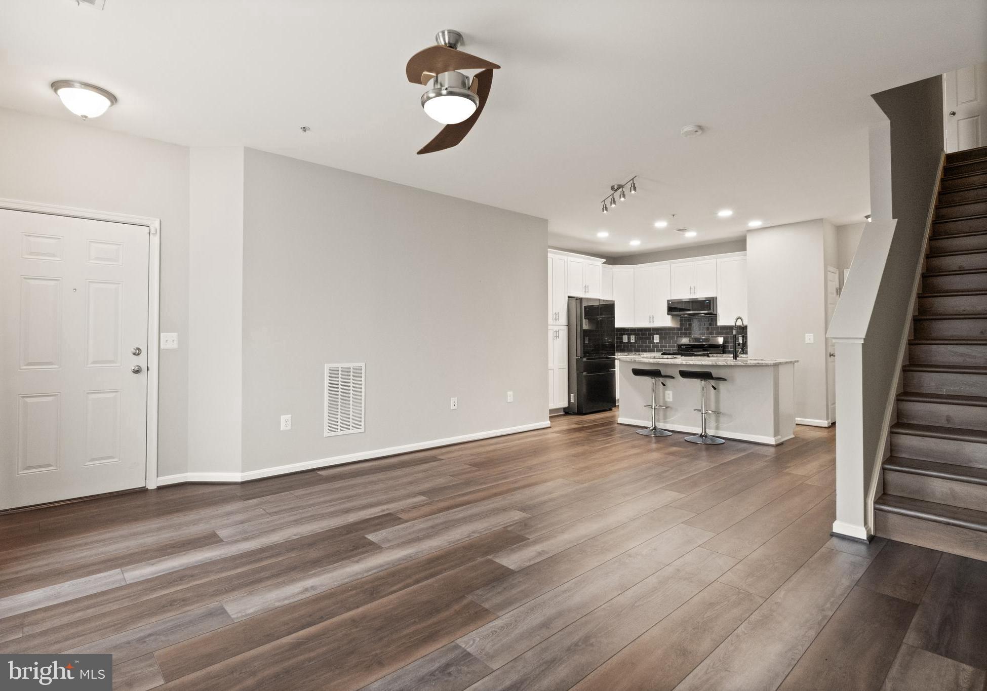 9541 Center Street Manassas, VA 20110 - Photo 12 of 41 a view of kitchen with microwave and stove