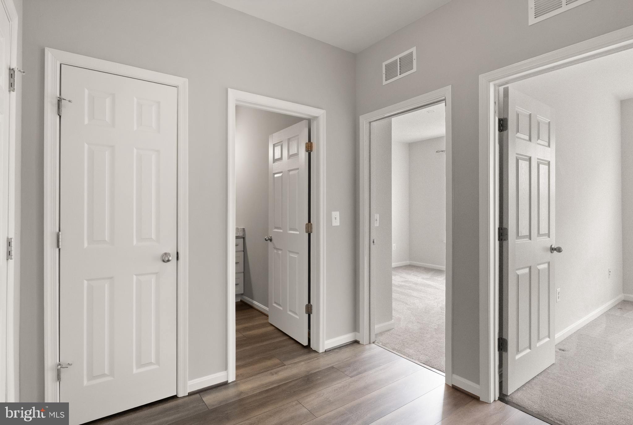 9541 Center Street Manassas, VA 20110 - Photo 19 of 41 a view of a hallway with wooden floor