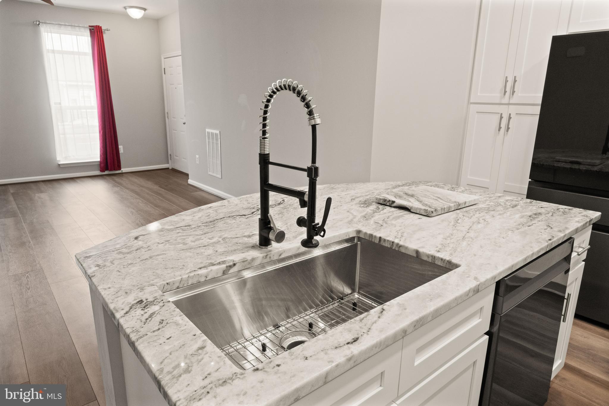 9541 Center Street Manassas, VA 20110 - Photo 2 of 41 a kitchen with a sink and a stove