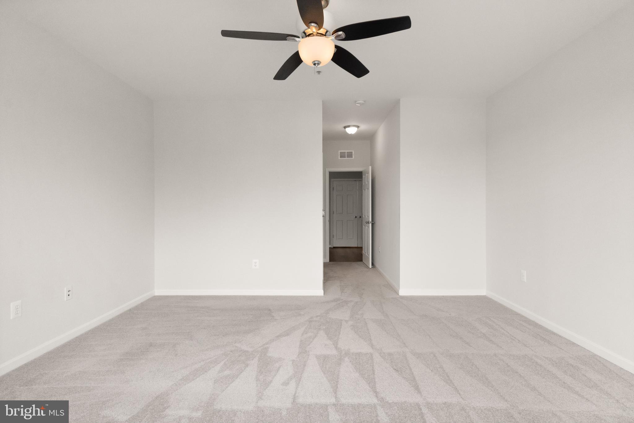 9541 Center Street Manassas, VA 20110 - Photo 28 of 41 a view of a room with a ceiling fan and a ceiling fan
