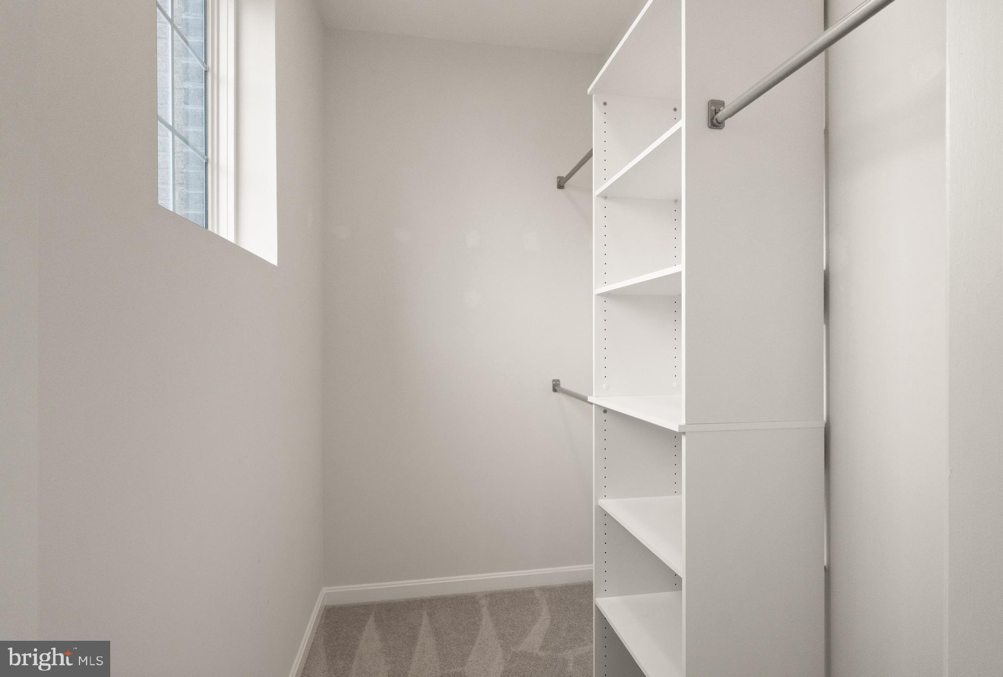 9541 Center Street Manassas, VA 20110 - Photo 37 of 41 a view of an empty walk in closet