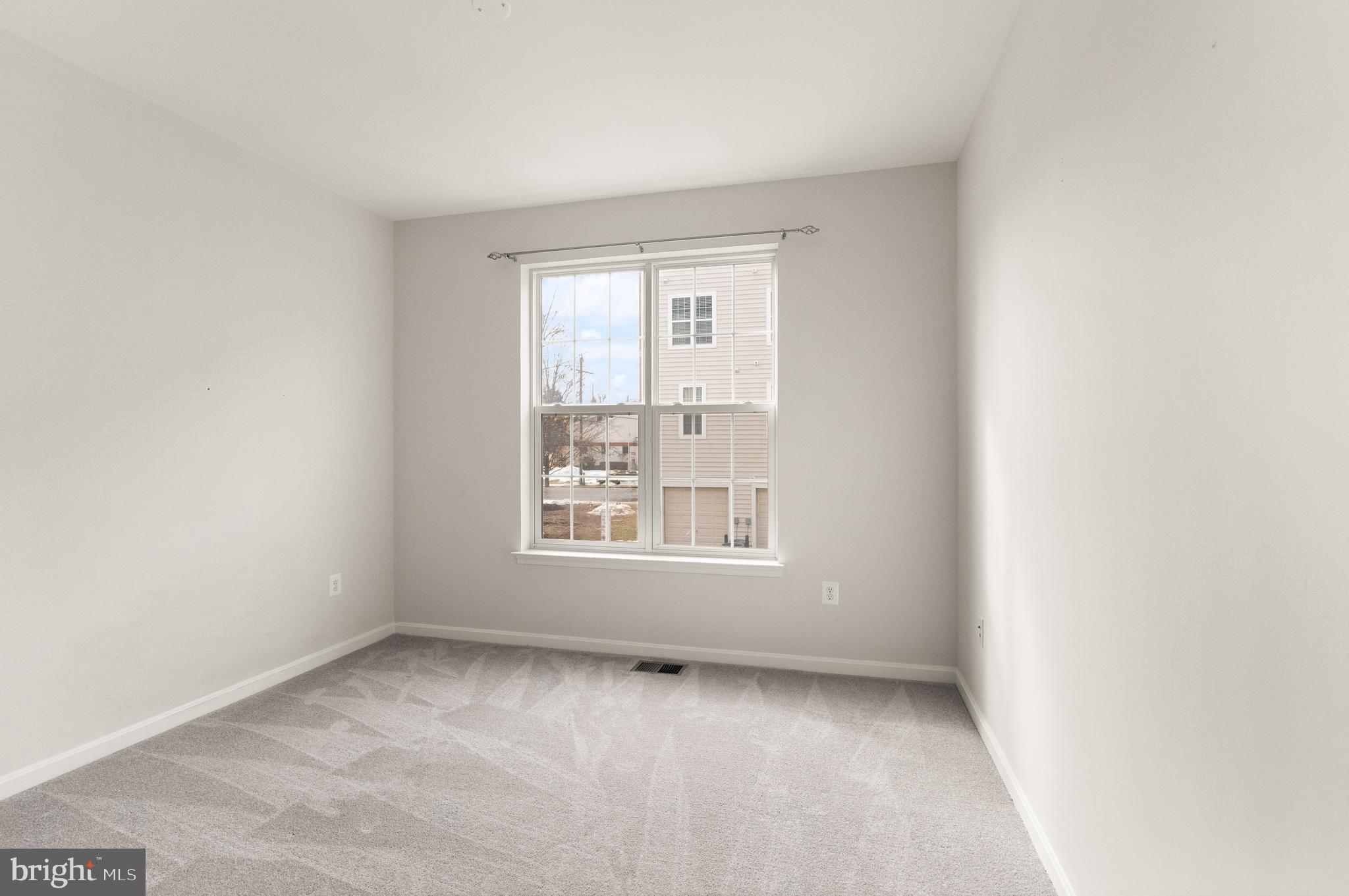 9541 Center Street Manassas, VA 20110 - Photo 39 of 41 an empty room with a window