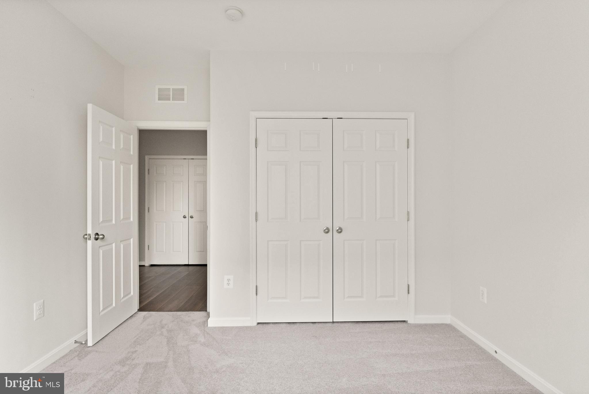 9541 Center Street Manassas, VA 20110 - Photo 40 of 41 a view of room with closet area