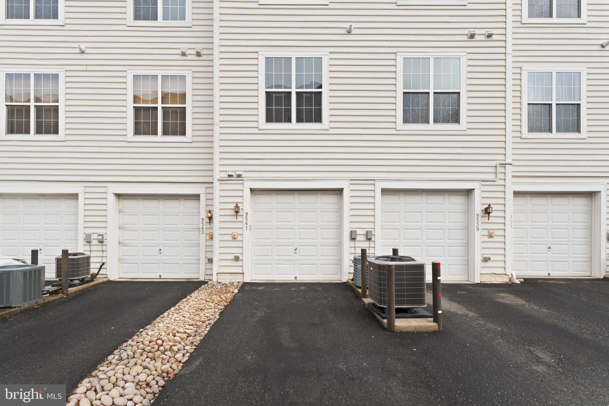 9541 Center Street Manassas, VA 20110 - Photo 41 of 41 a view of a house with a barbeque and chair and a barbeque