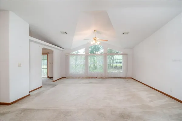 a kitchen with a stove sink and microwave