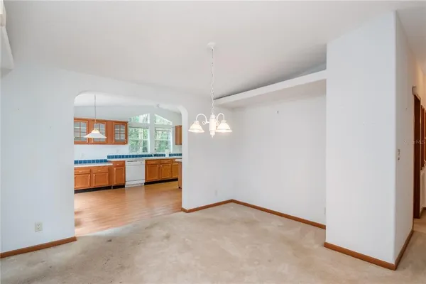 a kitchen with stainless steel appliances a sink and a stove