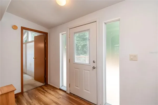 a kitchen that has a stove and a refrigerator