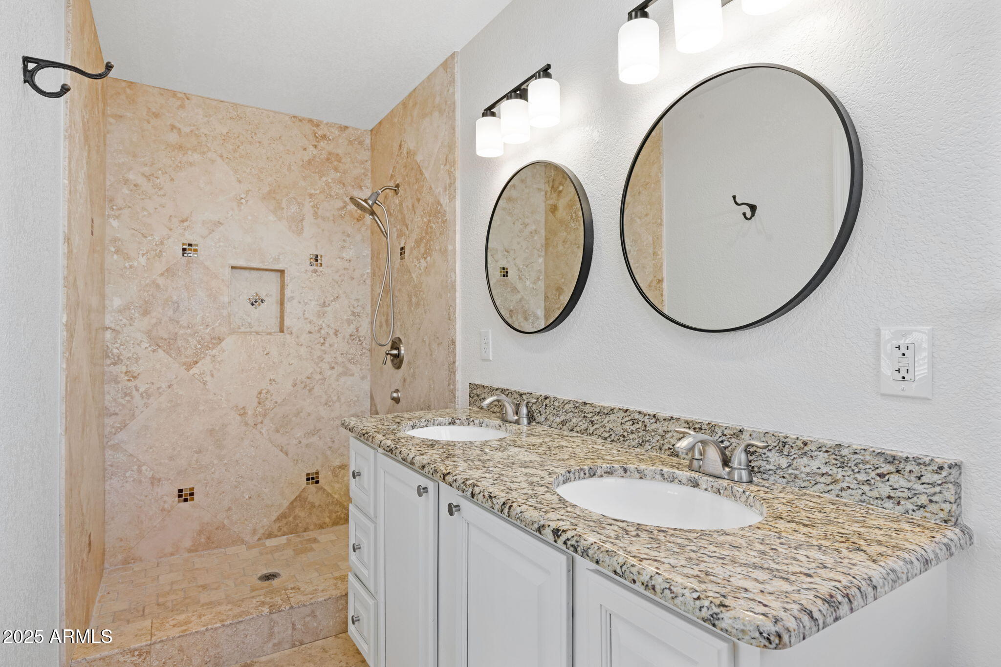 4020 North 44th Place Phoenix, AZ 85018 - Photo 12 of 17 a bathroom with a sink and a mirror