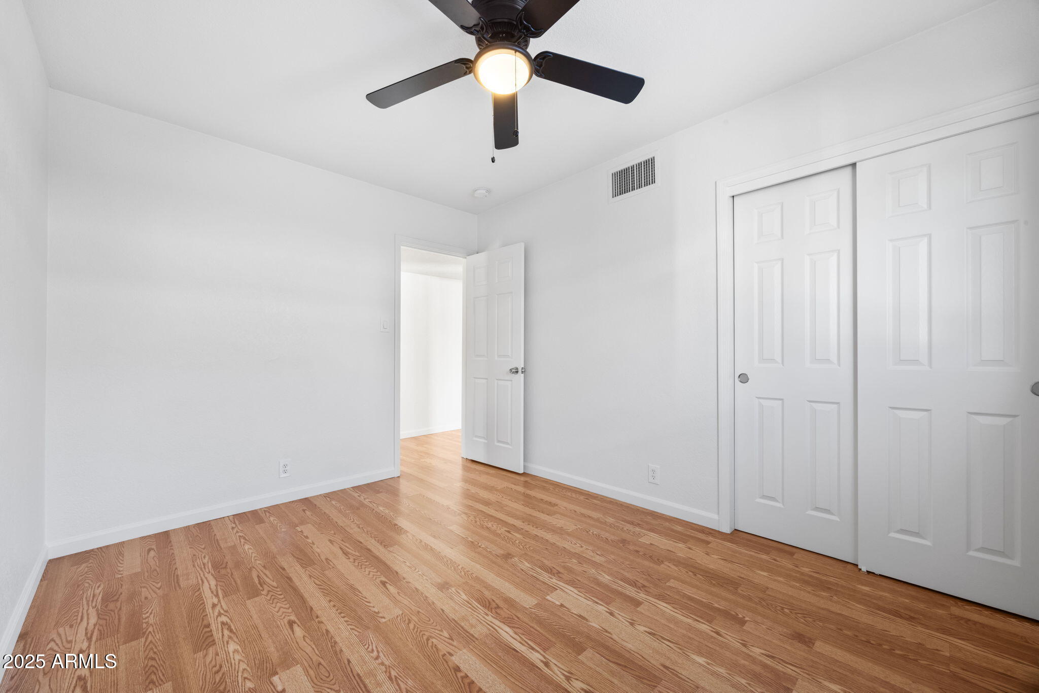4020 North 44th Place Phoenix, AZ 85018 - Photo 16 of 17 wooden floor in an empty room
