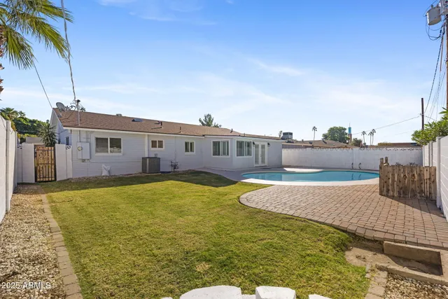 a view of a house with swimming pool