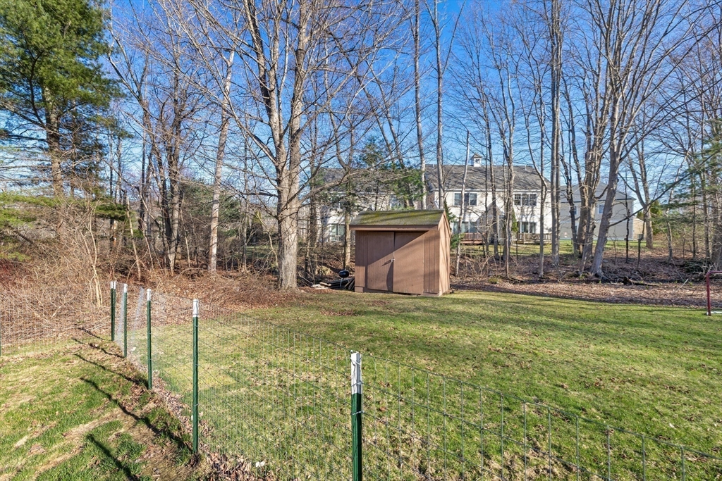 38 Brook Street Georgetown, MA 01833 - Photo 31 of 42 a view of a yard with large trees