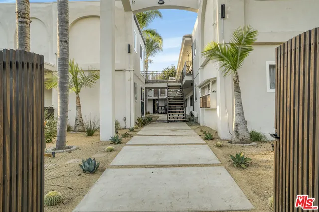 a view of a house with backyard of the house