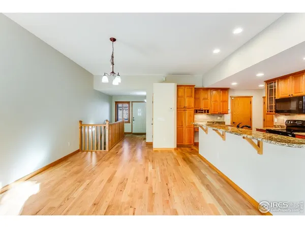 a very nice looking living room with a large window