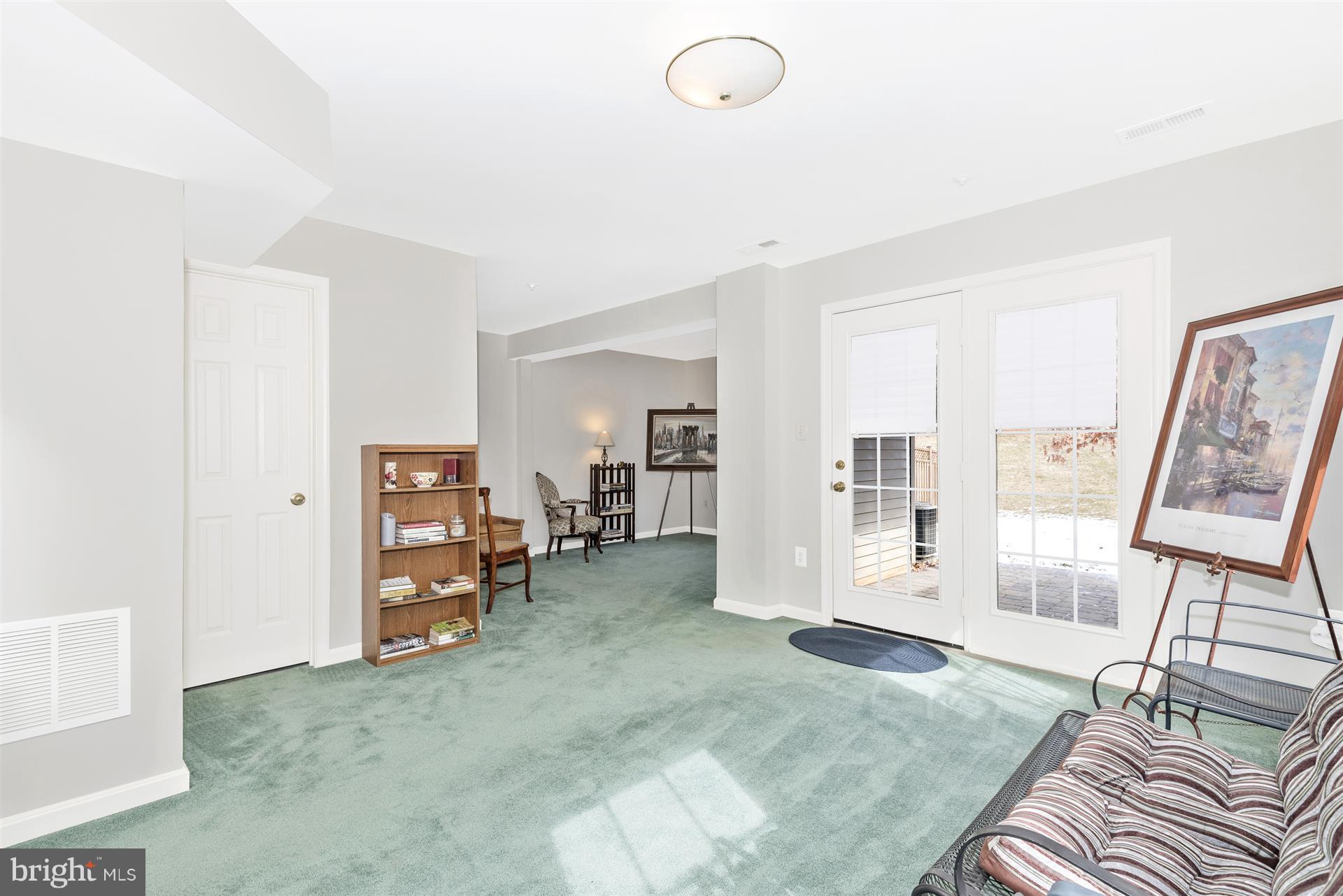 2400 Rippling Brook Road Frederick, MD 21701 - Photo 20 of 30 LL rec room has doors to paver patio and garage